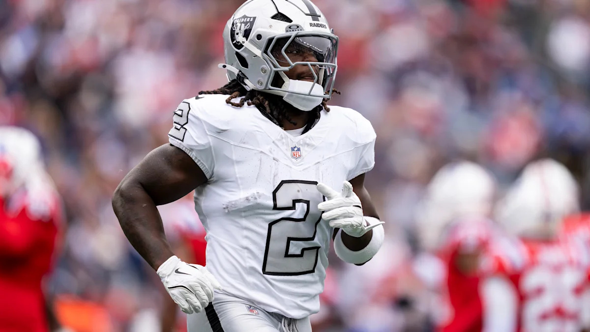 Running back em campo pelo Dallas Cowboys; imagem ilustrativa da tabela de fantasy.