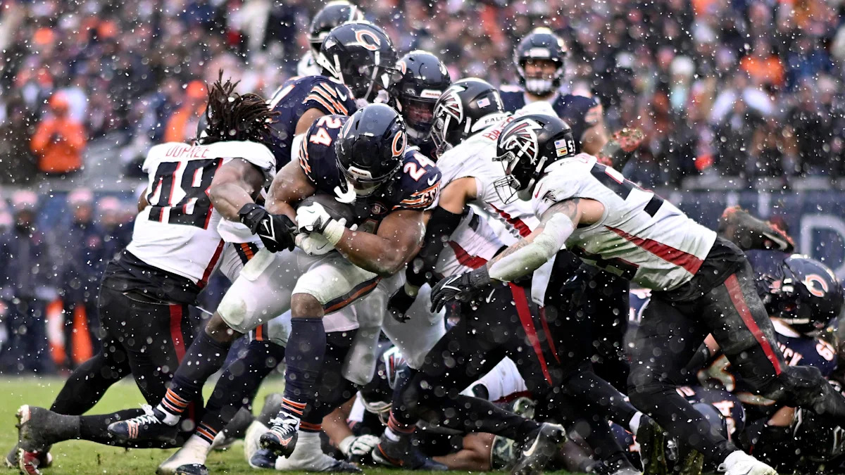 Khalil Herbert corre contra os Falcons em 31 de dezembro de 2023; imagem de arquivo.