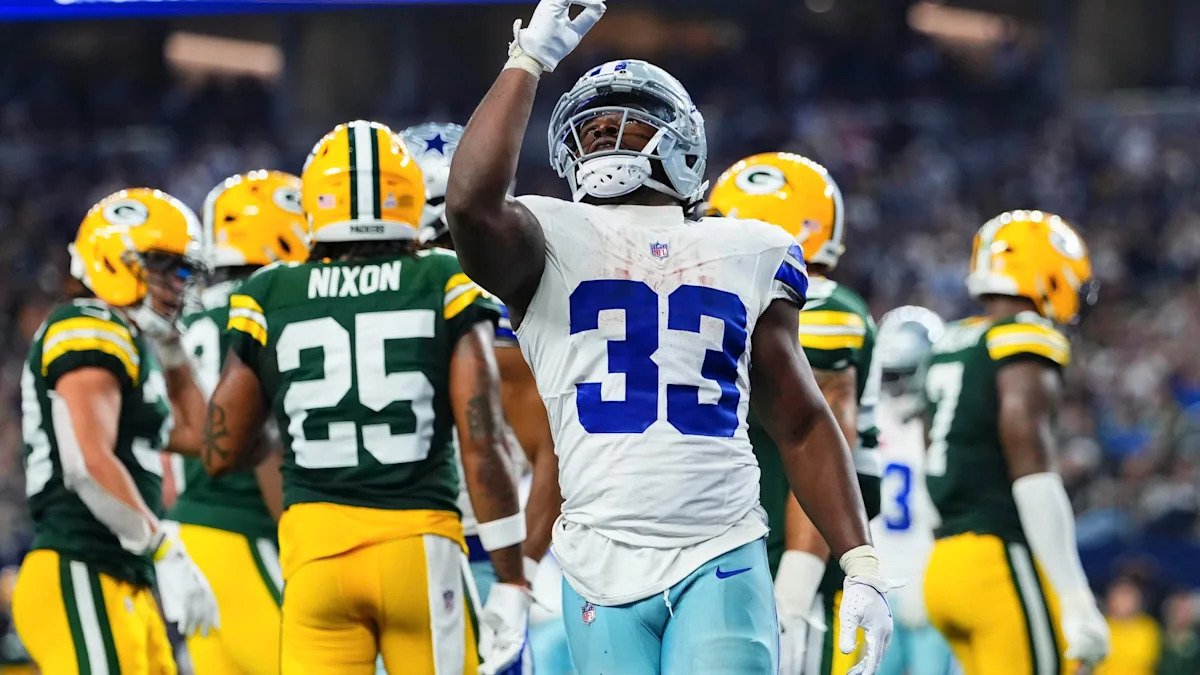 Running back do Dallas Cowboys em campo contra os Packers; imagem ilustrativa da análise do jogo terrestre.