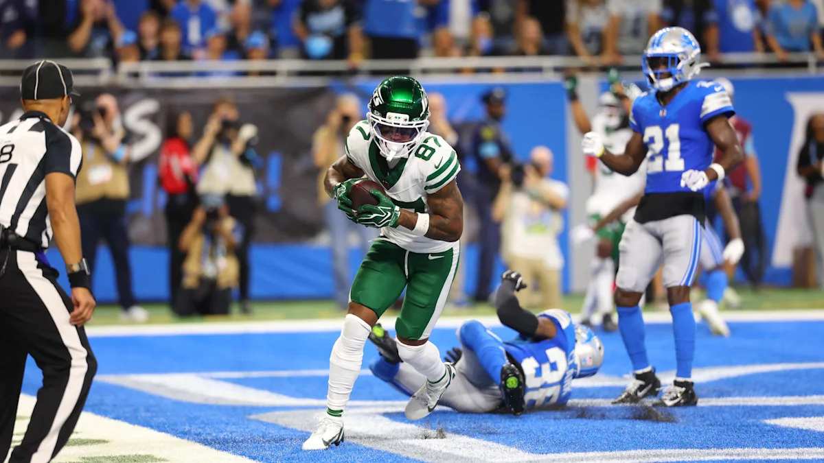 Sterling Shepard marca conversão de dois pontos pelos Jets contra os Lions em 27 de setembro de 2026.