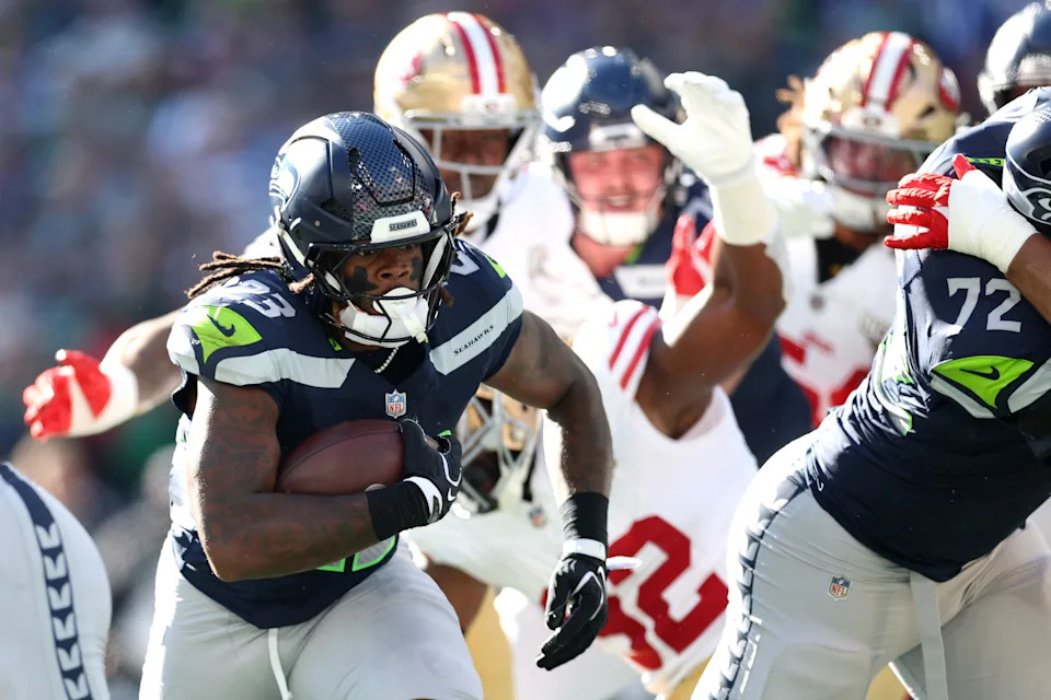 Emanuel Wilson corre para touchdown dos Seahawks contra os 49ers em 11 de outubro de 2026.
