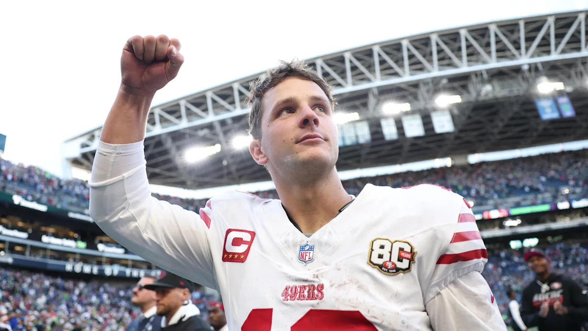 Brock Purdy comemora a vitória dos 49ers sobre Seattle em 11 de outubro de 2026.