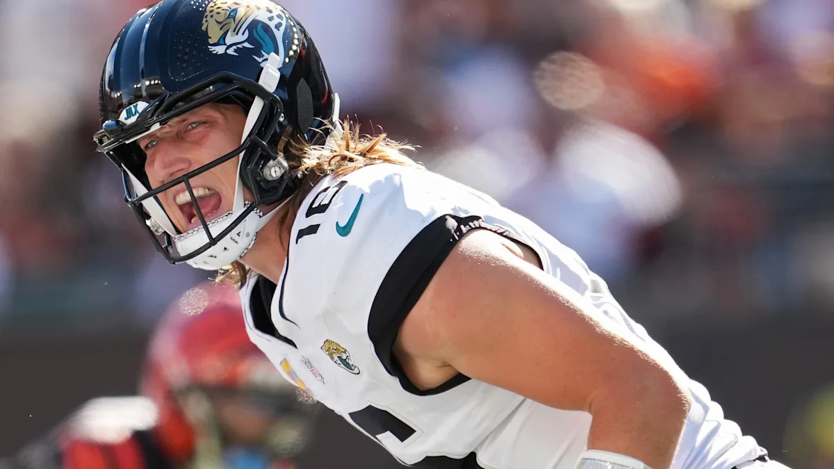 Jogador dos Eagles com o uniforme branco.