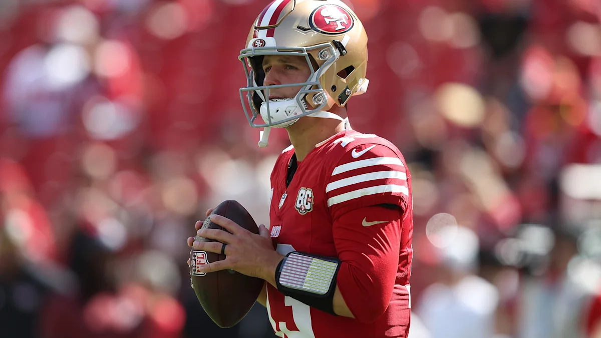 Quarterback dos San Francisco 49ers em campo.