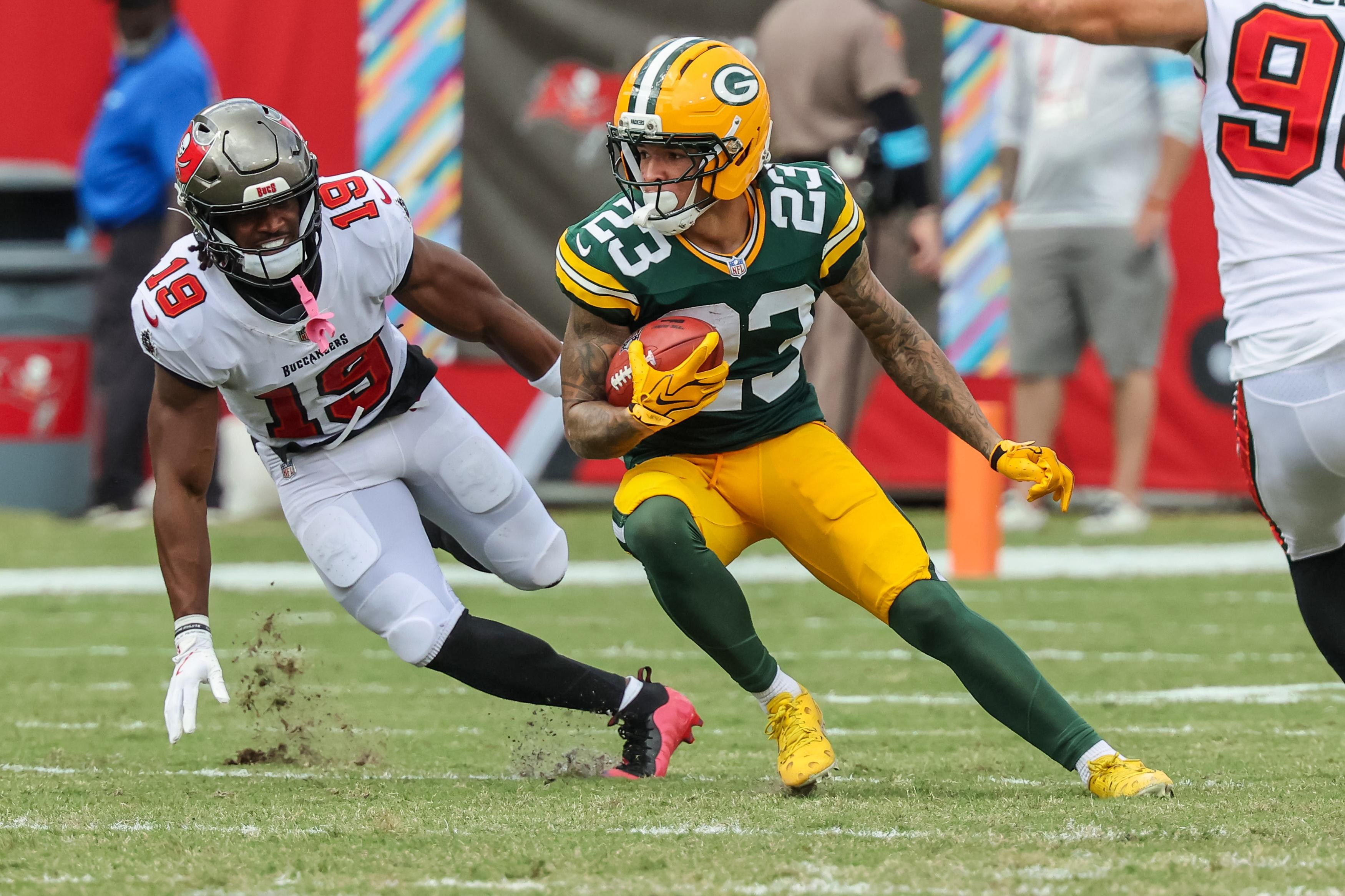Jogadores do Green Bay Packers em partida da NFL.