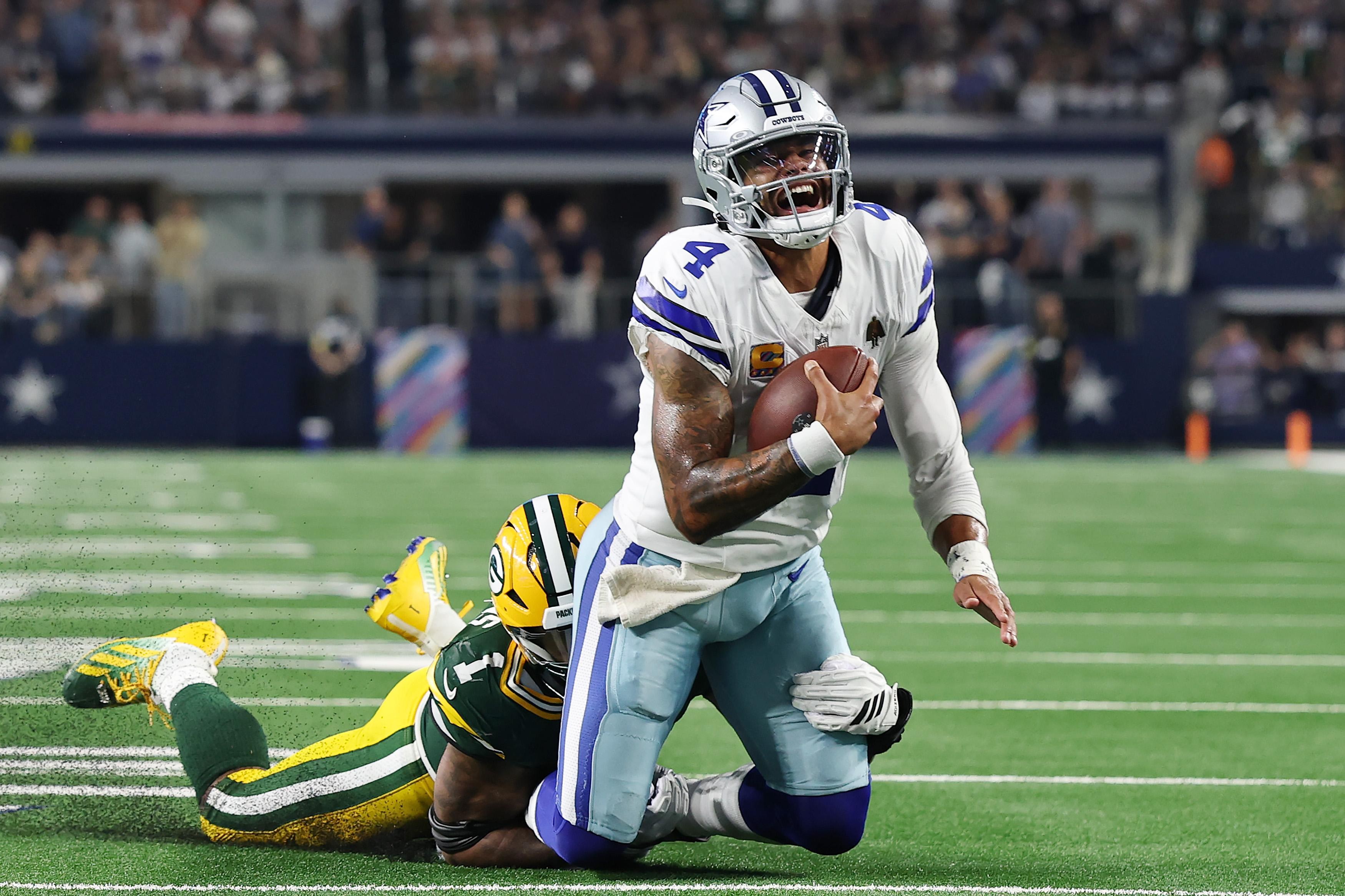 Cowboys e Packers durante um confronto em imagem de arquivo.