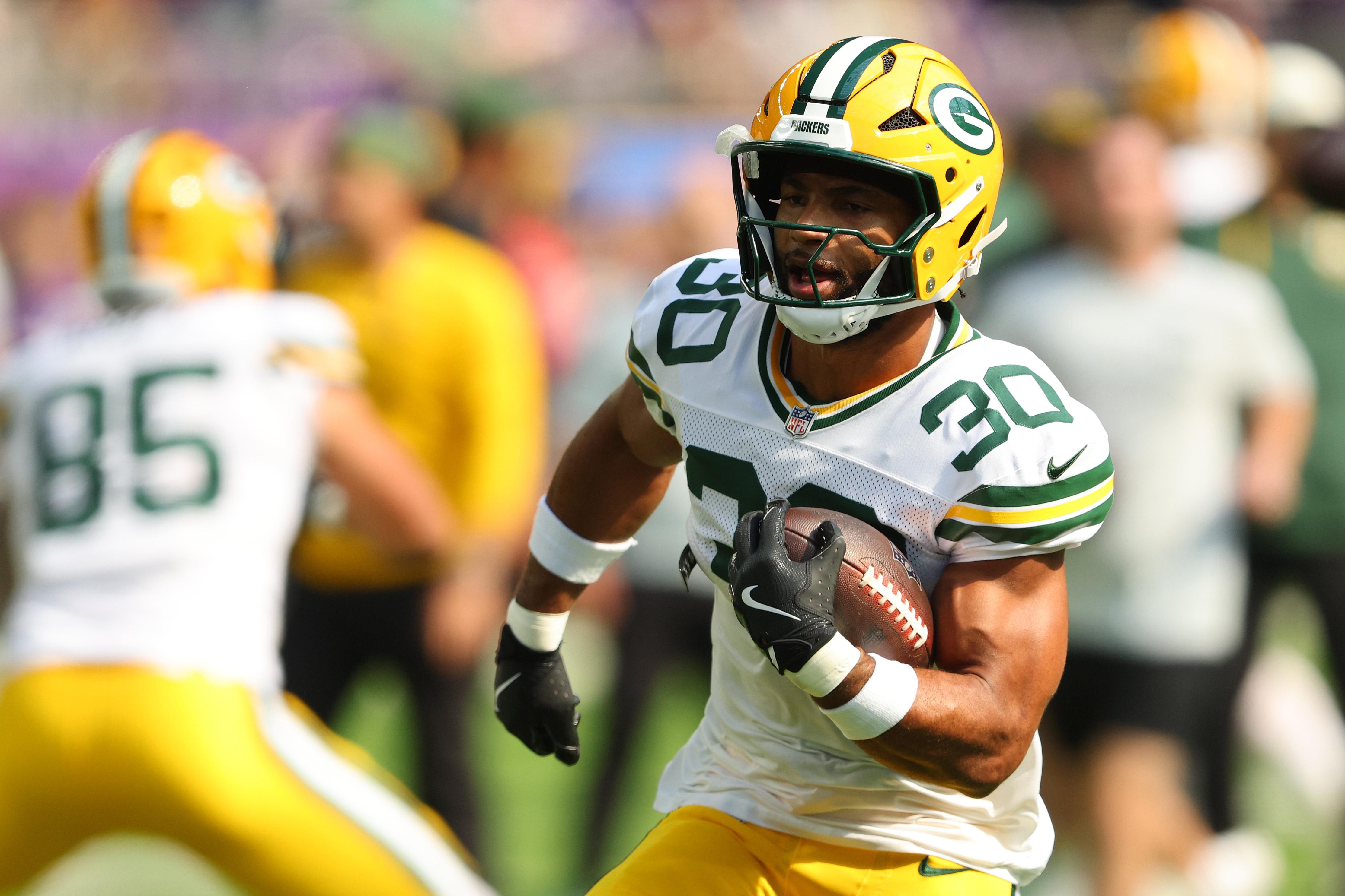 Chris Brooks avança com a bola pelos Packers.