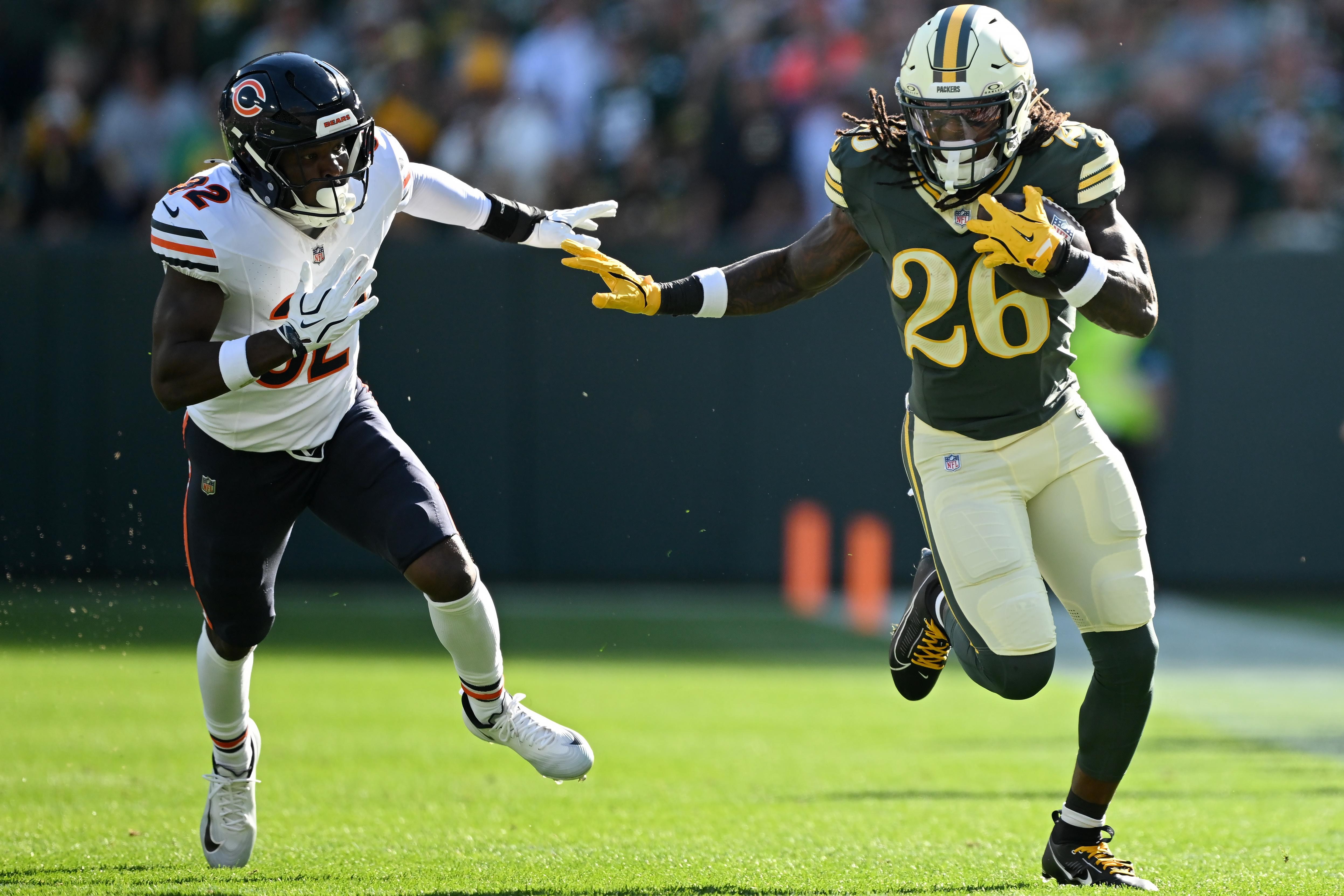Jogadores dos Bears e dos Packers durante o confronto em Green Bay.