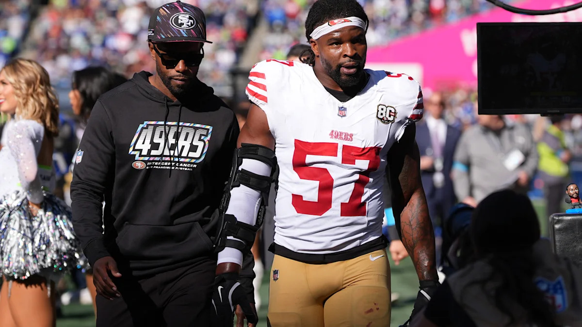 Dre Greenlaw em campo no confronto entre 49ers e Seahawks.