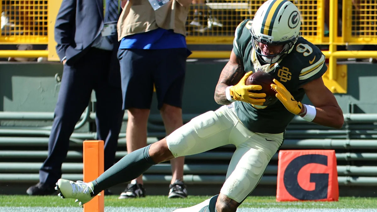 Christian Watson recebe a bola pelos Packers.