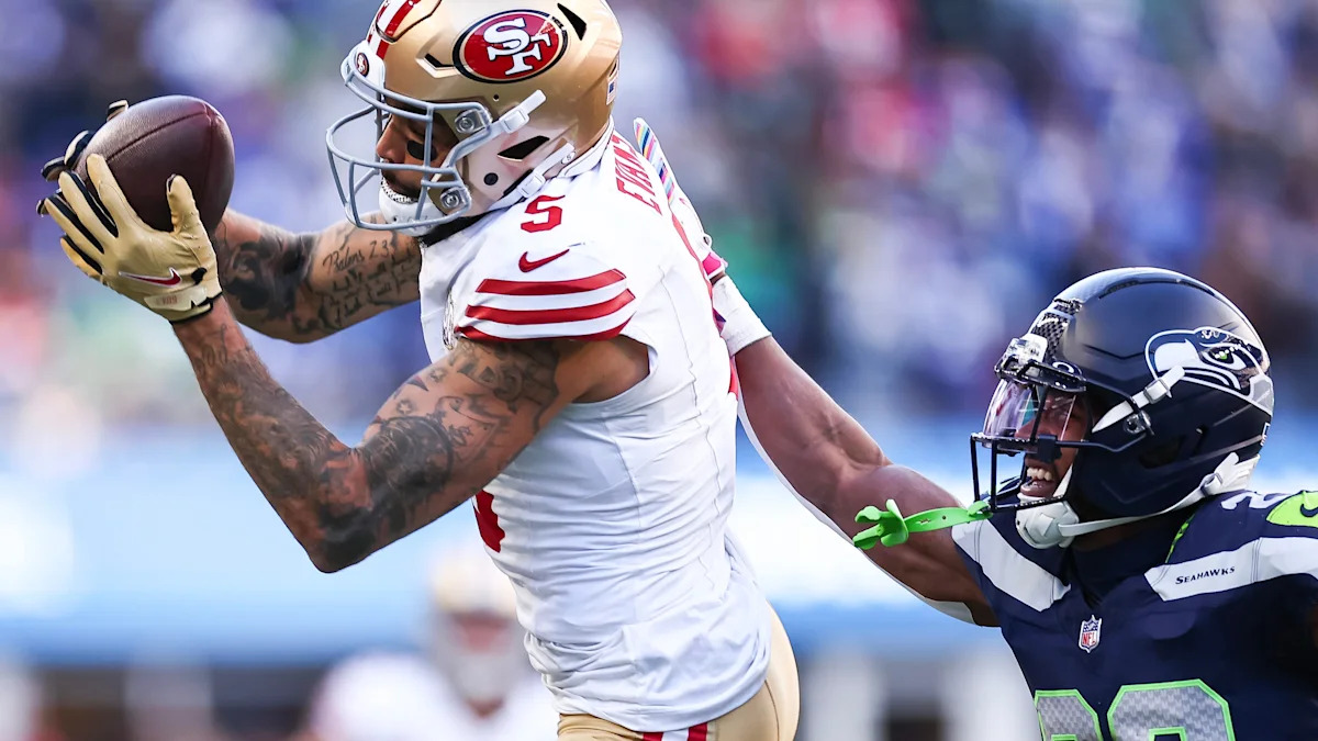 Mike Evans recebe a bola pelos 49ers diante dos Seahawks.